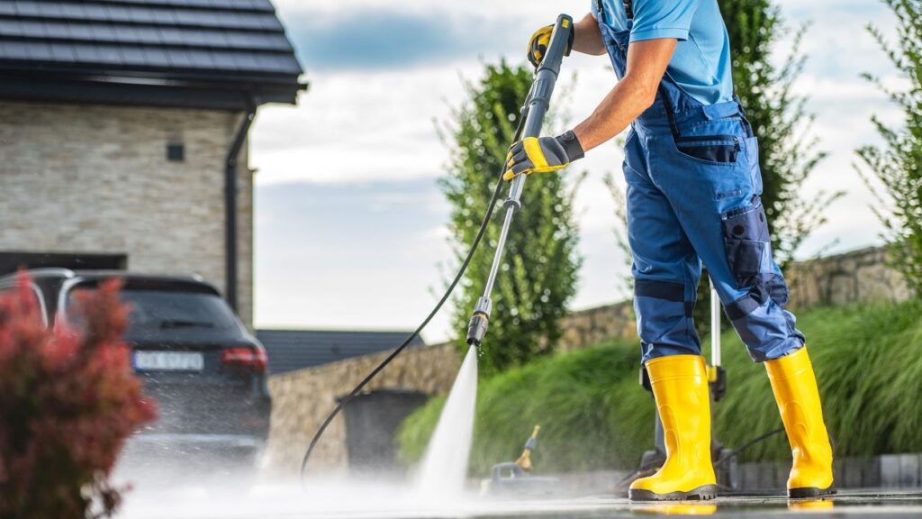 Powerful Pressure Washer Using to Clean Dirty Driveway